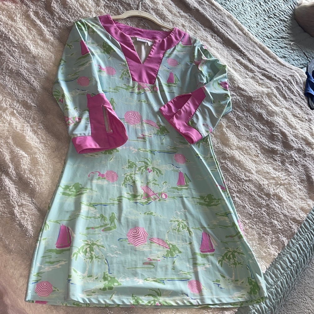 All for color swim material dress. Beach scape theme!